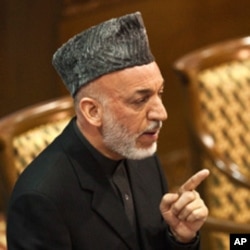 Afghan President Urges Pakistan to Attend Bonn Conference
