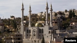A new mosque with four minarets is seen in the Israeli-Arab village of Abu Ghosh, near Jerusalem on November 22, 2013.