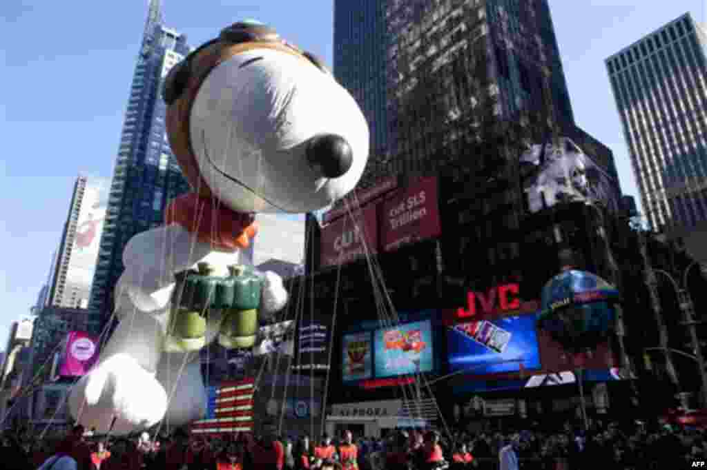 The "Snoopy" float is seen during the Macy's Thanksgiving Day Parade in Times Square in New York on Thursday, Nov. 24, 2011. The parade premiered in 1924, this is its 85th year. (AP Photo/Andrew Burton)