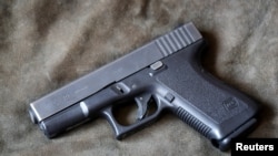 En la foto, una pistola Glock 19 de 9 mm.