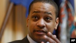 Virginia Lt. Gov. Justin Fairfax presides over the Senate at the Capitol in Richmond, Feb. 22, 2019. The chairman of the House Courts of Justice committee announced they will hold a hearing on the sexual accusations that have been placed against Fairfax.