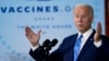 FILE - President Joe Biden speaks about COVID-19 vaccinations after touring a construction site for a Microsoft data center in Elk Grove Village, Illinois, Oct. 7, 2021.