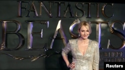 FILE - Writer J.K. Rowling poses as she arrives for the European premiere of the film "Fantastic Beasts and Where to Find Them" in Leicester Square in London, Nov. 15, 2016.