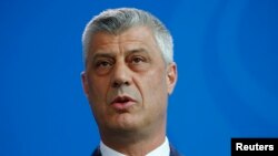 FILE - Kosovo's President Hashim Thaci speaks to reporters in Berlin, Germany, May 9, 2018. 