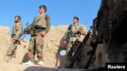 지난 20일 아프가니스탄 헬만드 주에서 정부 군이 전초기지를 지키고 있다. (자료사진)