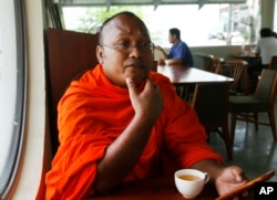 FILE - Cambodian Buddhist monk But Buntenh speaks during an interview about killing of prominent political analyst Kem Ley in Phnom Penh, Cambodia, Nov. 21, 2016. “The death of Kem Ley is the death of human rights in Cambodia."