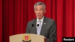 Singapore's Prime Minister Lee Hsien Loong hosts an ASEAN working dinner in Singapore, April 27, 2018.