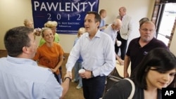Republican presidential candidate, former Minnesota Gov. Tim Pawlenty makes a campaign stop at Coffee Cup Cafe in Sully, Iowa, Tuesday, Aug. 9, 2011
