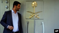 Officials leave Saudi Arabia consulate in Istanbul, Oct. 7, 2018. A friend of a Saudi journalist who went missing in Istanbul says officials told him to "make your funeral preparations" as the Washington Post contributor "was killed" at the Saudi Consulat