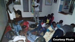 Students get ready to sleep in one of the rooms of the South Sudan Embassy. They've complained of living in cramped spaces with little food. (Photo courtesy of South Sudanese students)
