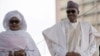 Le président nigérian Muhammadu Buhari arrive avec sa femme Aisha, avant de prêter serment sur la place Eagles à Abuja, le 29 mai 2015.