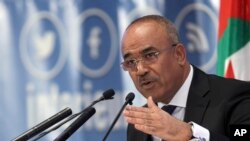 FILE: Noureddine Bedoui answers a question during a news conference. Taken 11.24.2017 when Bedoi was Interior Minister