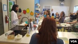 Pediatrician Nimali Fernando, "Dr. Yum," leads a cooking class for new parents at her practice near Washington, DC.