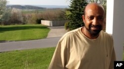 Ethiopian opposition figure Berhanu Nega, shown at his home in Pennsylvania April 25, 2009, is calling for talks with the government in Addis Ababa following the death of Prime Minister Meles Zenawi.