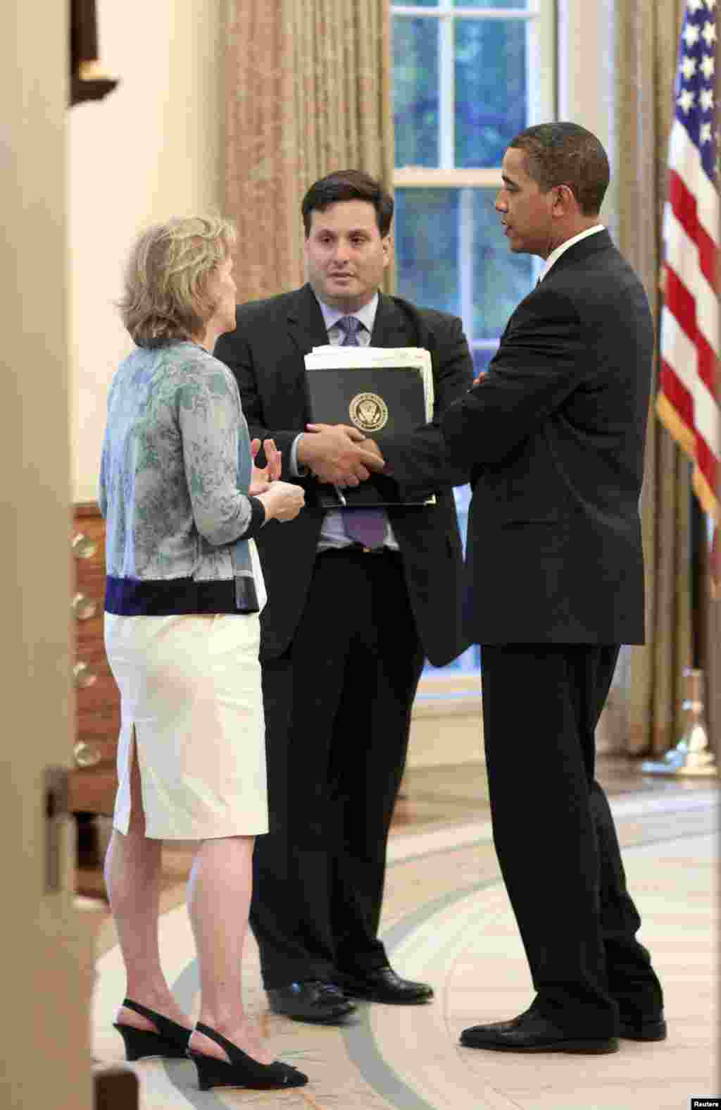 In this file photo dated May 21, 2009, President Barack Obama meets with Ron Klain, then chief of staff to the vice president. Klain was recently appointed the U.S. Ebola czar and his post is effective as of Oct. 22, 2014. 