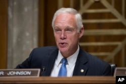 FILE - Sen. Ron Johnson, R-Wis., chairs a hearing on Capitol Hill in Washington, Aug. 1, 2017.