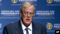 FILE - David Koch speaks in Orlando, Florida, Aug. 30, 2013. The Koch brothers and their chief lieutenants are warning of a rapidly shrinking window to push their agenda through Congress. 
