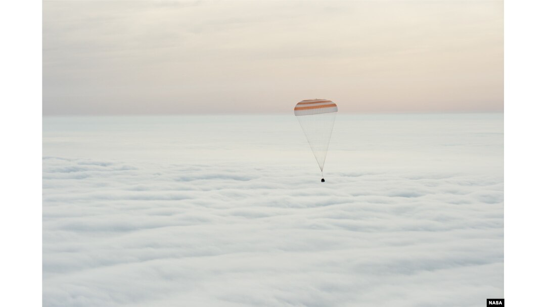 The Soyuz TMA-18M spacecraft is seen as it lands with Expedition 46 Commander Scott Kelly of NASA and Russian cosmonauts Mikhail Kornienko and Sergey Volkov of Roscosmos near the town of Zhezkazgan, Kazakhstan on Wednesday, March 2, 2016.