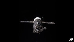 Unpiloted ISS Progress resupply vehicle approaches space station, Nov. 2, 2011.