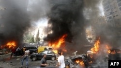 A car bomb explodes on July 9 in Beirut's southern suburbs, stronghold of Lebanon's Shiite Hezbollah movement, one of several attacks linked to Hezbollah's role in the Syrian civil war.
