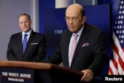 U.S. Commerce Secretary Wilbur Ross speaks next to White House press secretary Sean Spicer about new tariffs on Canadian softwood lumber from the White House in Washington, April 25, 2017.