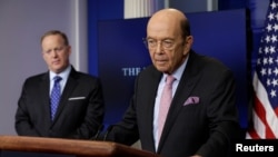 U.S. Commerce Secretary Wilbur Ross speaks next to White House press secretary Sean Spicer about new tariffs on Canadian softwood lumber from the White House in Washington, April 25, 2017.