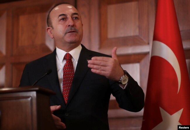 Turkish Foreign Minister Mevlut Cavusoglu speaks during a news conference in Ankara, Turkey, Jan. 14, 2019.