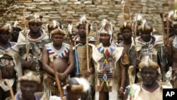 Traditional Ndebele men look on during a ceremony to honour Nelson Mandela by the African chiefs, kings and queens at Freedom Park in Pretoria November 5, 2009. Freedom Park is a memorial for those who sacrificed their lives for the freedom of South Afric