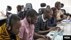 Andela fellows work on projects at the company's office on June 30, 2016 in Lagos, Nigeria. (Photo: Chris Stein for VOA)