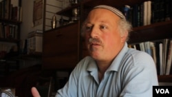 Daniel Pinner in his home in the Israeli settlement of Kfar Tapuach, July 27, 2012, says Israeli sovereignty extends from the Jordan River to the Mediterranean Sea. (VOA/Rebecca Collard).