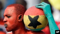 A Ghana supporter painted in his national colors attends the African Cup of Nations in Equatorial Guinea.