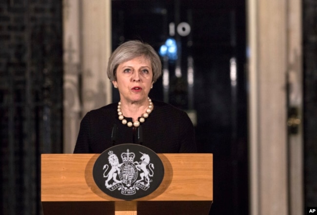 Britain's Prime Minister Theresa May gives a media statement outside 10 Downing street in London, March 22, 2017, following a terror attack in the Westminster area of London earlier Wednesday.