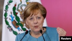 Germany's Chancellor Angela Merkel during a news conference at National Palace in Mexico City, June 9, 2017. 