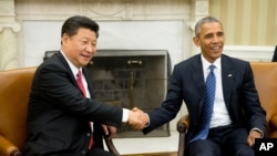 美國總統奧巴馬和中國國家主席習近平誓言通過解決彼此間的分歧來加強美中雙邊關係。