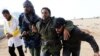 Quân chính phủ Libya và phe nổi dậy giao tranh giành các thị trấn