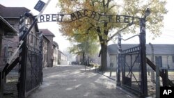 FILE - Entrance of Auschwitz at the former Nazi German death complex of Auschwitz-Birkenau in in Oswiecim, Poland.