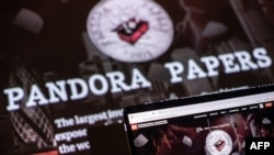 This photograph illustration shows the logo of Pandora Papers, in Lavau-sur-Loire, western France, on October 4, 2021.