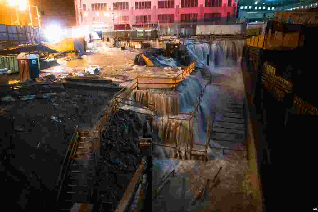 October 29: Sea water floods the Ground Zero construction site in New York. Superstorm Sandy forced the shutdown of mass transit, schools and financial markets and sent coastal residents fleeing.