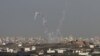 Israel Fires into Syria, Violence Also Flares on Gaza Border