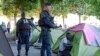 Evacuation d'un campement de 450 migrants en France
