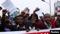 FILE - Protesters chant slogans during a demonstration in Ethiopia's capital Addis Ababa, Aug. 6, 2016. 