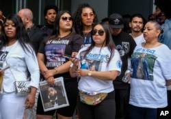 Fans of rapper Nipsey Hussle wait in line to attend his public memorial service at Staples Center in Los Angeles, April 11, 2019. Hussle was killed in a shooting outside his Marathon Clothing store in south Los Angeles, March 31.