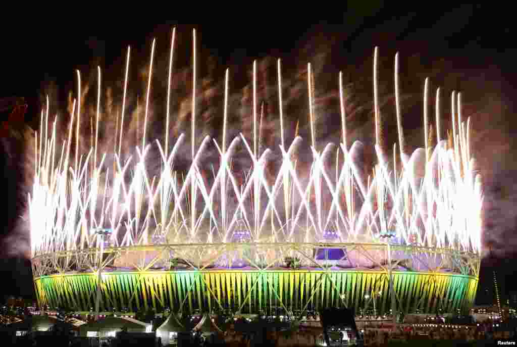 Fireworks explode over the Olympic Stadium during the closing ceremony of the London 2012 Olympic Games August 12, 2012. 
