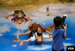 People might use visual tricks to fool their friends - like this one at the Trick Eye Museum in Singapore, which makes it look like the man is sky diving when the photo is inverted (Reuters).