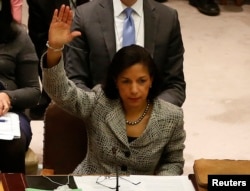 U.S. Ambassador to the United Nations Susan Rice votes to tighten sanctions on North Korea at the United Nations Headquarters in New York, March 7, 2013.