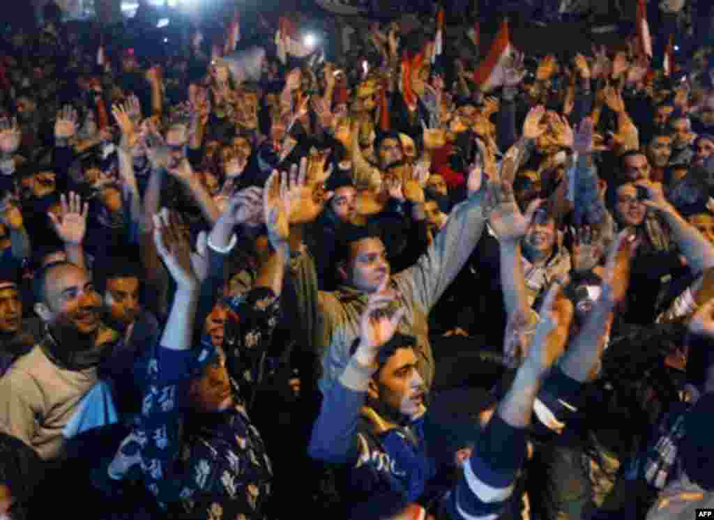 Egyptian citizens celebrate after President Hosni Mubarak resigned and handed power to the military at Tahrir Square, in Cairo, Egypt, Friday, Feb. 11, 2011. Egypt exploded with joy, tears, and relief after pro-democracy protesters brought down President 