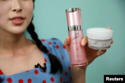 Kang Na-ra, a North Korean defector who is now a beauty YouTuber, shows North Korean cosmetic products, in Seoul, South Korea, June 11, 2019. Picture taken on June 11, 2019.