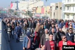 Kurdish protesters attend a rally against the Kurdish Regional Government (KRG) in Sulaimaniyah, Iraq Dec. 18, 2017.