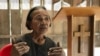 Im Chaem, a former Khmer Rouge cadre, talks VOA Khmer about the land she has dedicated to build a church, in Anlong Veng district, Oddar Meanchey province, on Dec. 12, 2019. (Hul Reaksmey/VOA Khmer