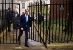 Britain's Foreign Secretary Dominic Raab arrives in Downing Street, London, Monday April 6, 2020.(Dominic Lipinski/PA via AP)